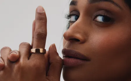 A close-up of the Oura Ring 5 showing its reduced size and upgraded sensor array.