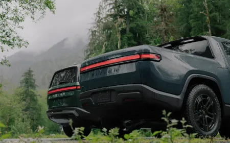 The Rivian dashboard displays the AI voice assistant interface for cabin control.