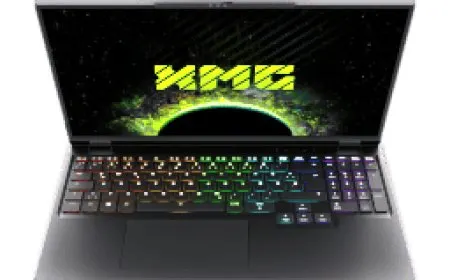 The XMG Neo 16 E25 laptop connects to an external Oasis water cooler for thermal management.