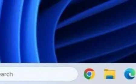 The Windows 11 taskbar is repositioned at the bottom of the screen in an experimental build.