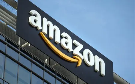 A corporate building exterior symbolizes Amazon strategic restructuring and workforce adjustments.