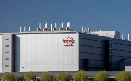 TSMC semiconductor factory exterior illustrating ongoing labor negotiations and bonus disputes