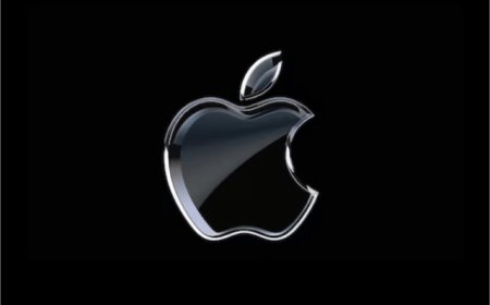 Apple logo and artificial intelligence graphics displayed at the WWDC 2026 developer conference stage.