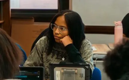 Students in a Kansas City Public Schools classroom use newly deployed Apple iPads and MacBooks.