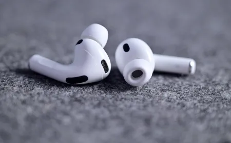 The iOS 27 settings menu displays a redesigned interface for managing AirPods audio controls.