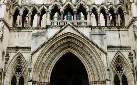 A Post Office branch exterior displays legal documents regarding Horizon appeal reforms and subpostmaster justice.