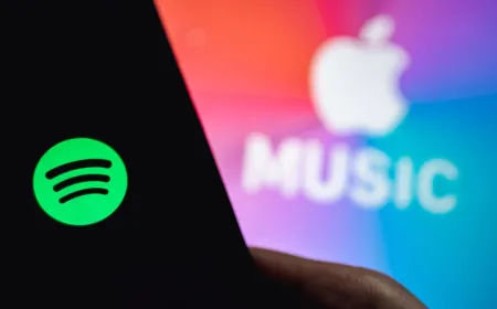 Apple devices display the music streaming interface to demonstrate cross-platform playback limitations.