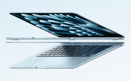 The Apple MacBook Air M4 laptop sits open on a desk.