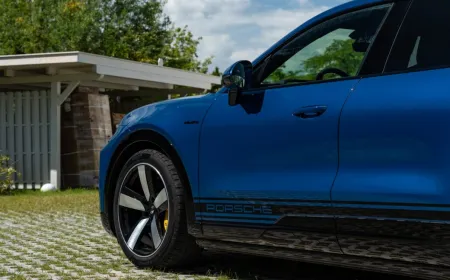 The Porsche Cayenne Turbo Coupe displays its aerodynamic coupe profile and sporty stance.