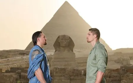 Oleksandr Usyk defends his WBC heavyweight title against Rico Verhoeven during their championship bout in Egypt.