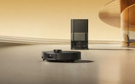 The Dreame L50s Pro Ultra and L50 Ultra AE robot vacuums stand beside their self-cleaning mopping stations.