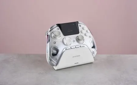 The Manba One controller features a central display screen and supports cross-platform connectivity.