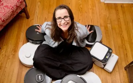 A robot vacuum maps a room layout while navigating around furniture to optimize automated cleaning paths.