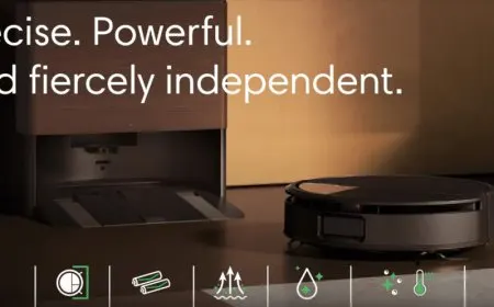 iRobot robotic vacuum cleaners are displayed alongside corporate acquisition documents.