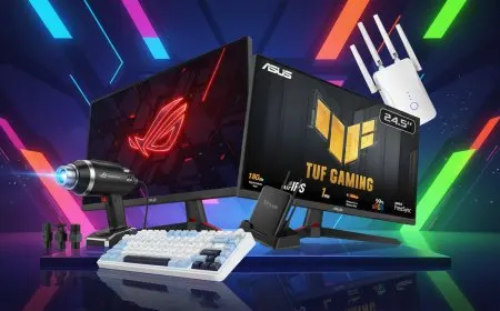 A desktop computer setup displays a keyboard, monitor, and internal hardware components on a work surface.