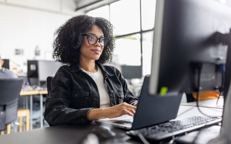 Women and girls learning artificial intelligence skills in a collaborative workshop