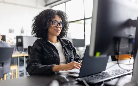 Women and girls learning artificial intelligence skills in a collaborative workshop