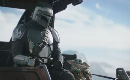 A theater marquee displays the theatrical release title for The Mandalorian and Grogu.