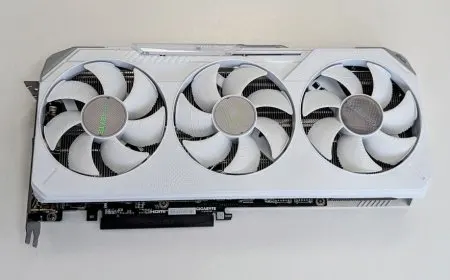 The white Gigabyte Radeon RX 9070 XT Gaming OC Ice graphics card features a triple fan cooling design.