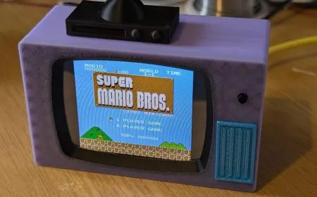 This palm-sized retro television features an ESP32 microcontroller and color display for gaming and video playback.
