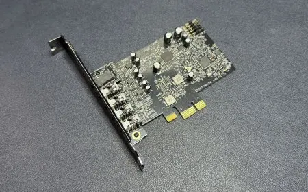 The Creative Sound Blaster Audigy FX Pro sound card displays rear audio ports and internal circuitry.