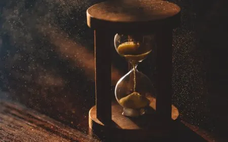 Historical timekeeping instruments illustrate the development of horology from ancient origins to modern precision.