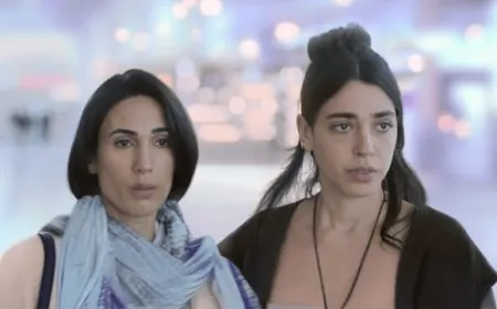 The image shows a dramatic scene from the limited series Unconditional depicting a mother navigating conflict.