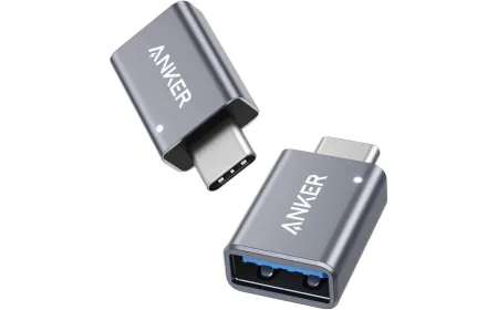 Two compact Anker USB-C to USB-A adapters are shown.