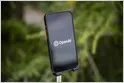 OpenAI and Visa logos displayed alongside a digital payment interface representing their AI agent purchasing partnership.