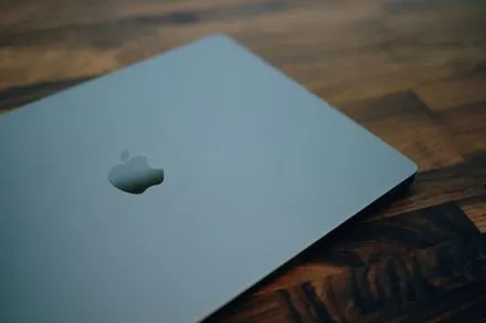 Concept rendering of the rumored Apple MacBook Ultra highlighting its hybrid OLED display and new screen sizes.