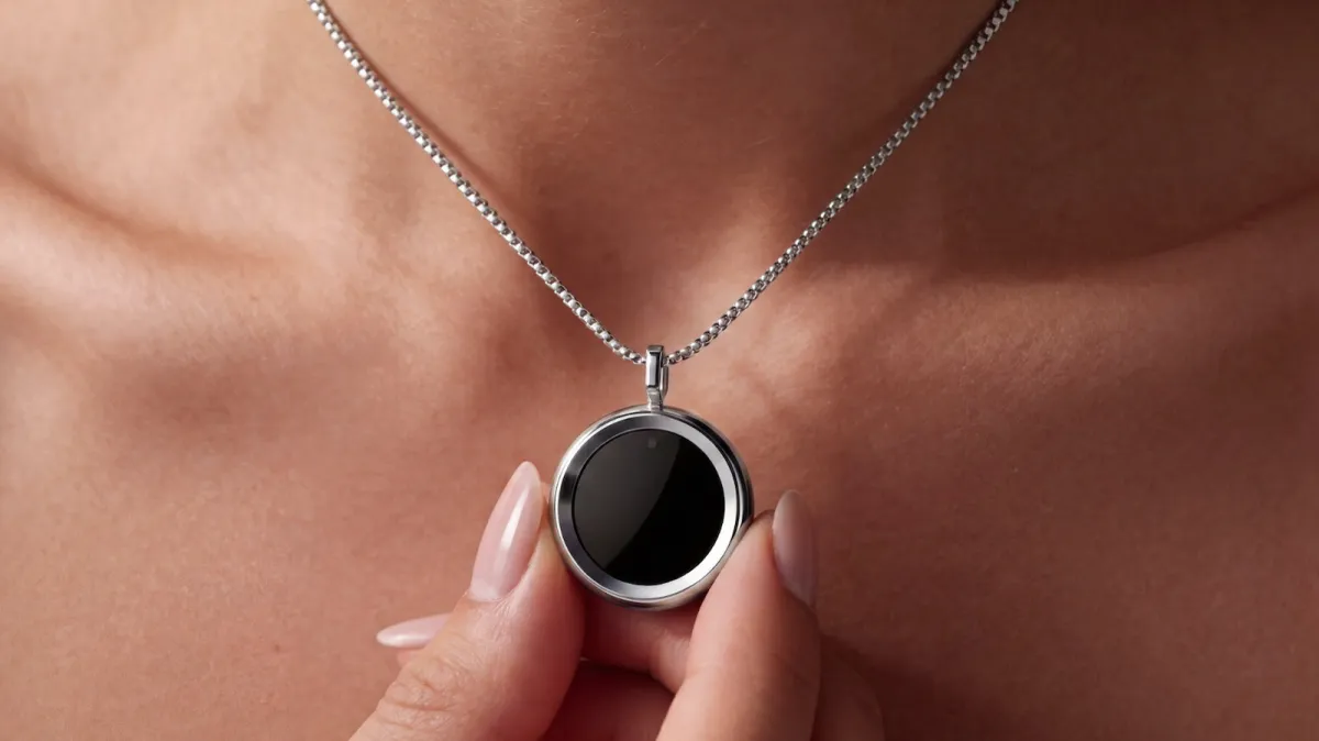 The Gem smart pendant necklace tracks real-time UVA and UVB exposure to manage daily sunlight intake.