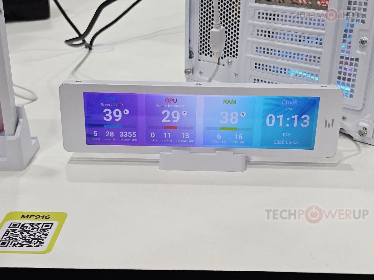 Zalman ZET series cooling hardware sits alongside companion displays for real-time system telemetry.