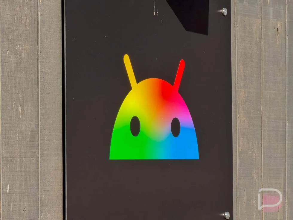A smartphone screen displays quarterly Android software updates and interface adjustments.