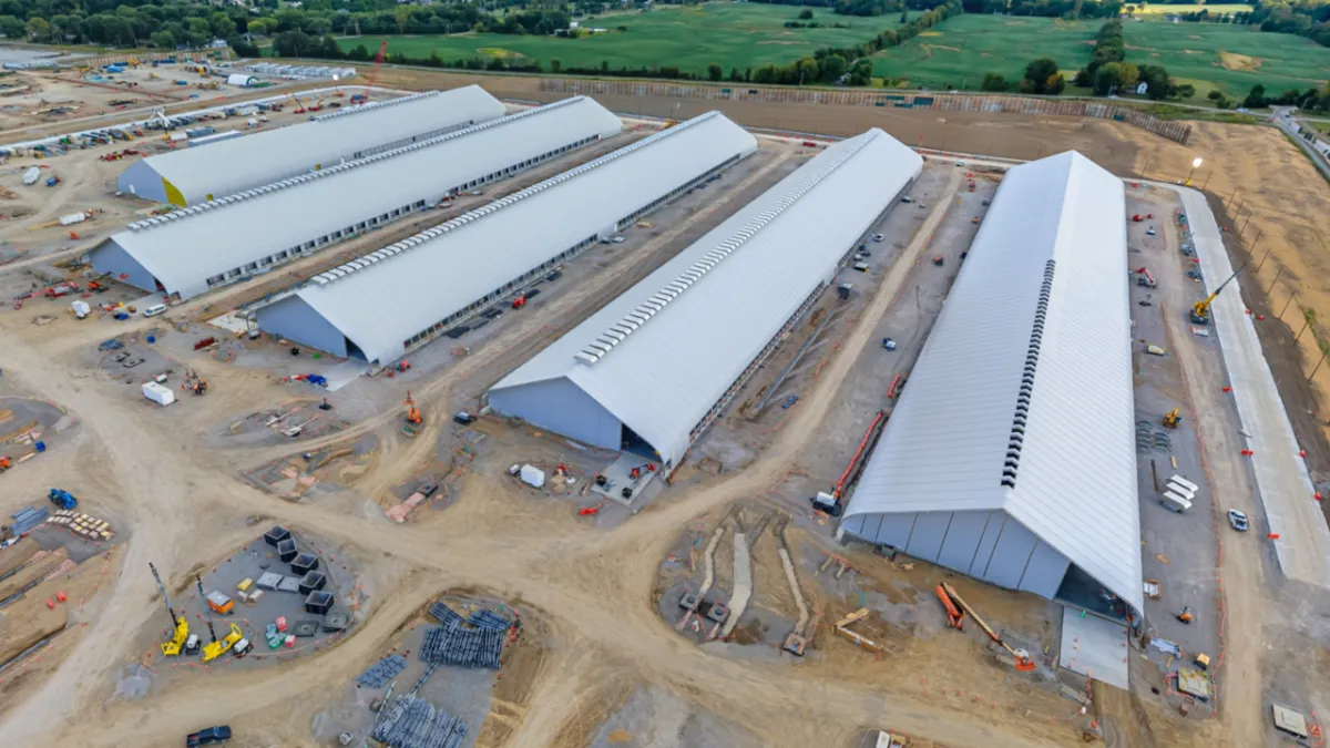 Jet engines power a temporary tent structure that serves as a rapid deployment data center for artificial intelligence.