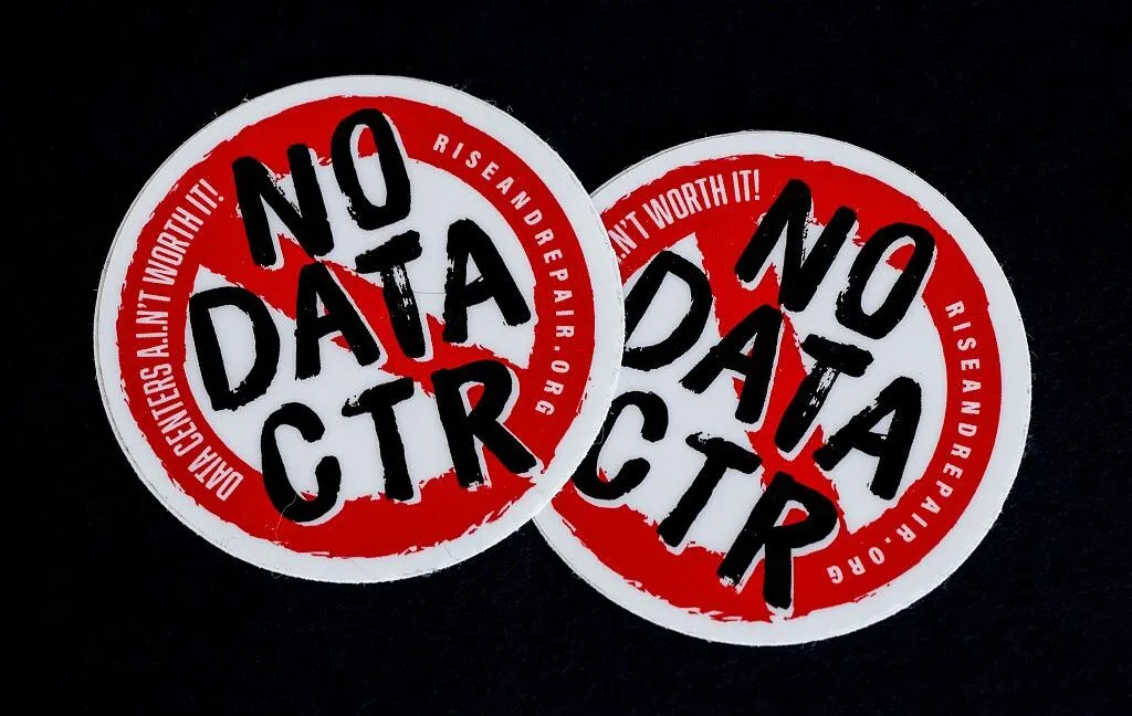Protesters gather to oppose the construction of new artificial intelligence data centers.