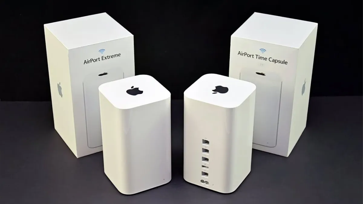 Apple Time Capsule network storage device next to a Mac computer running macOS 27.