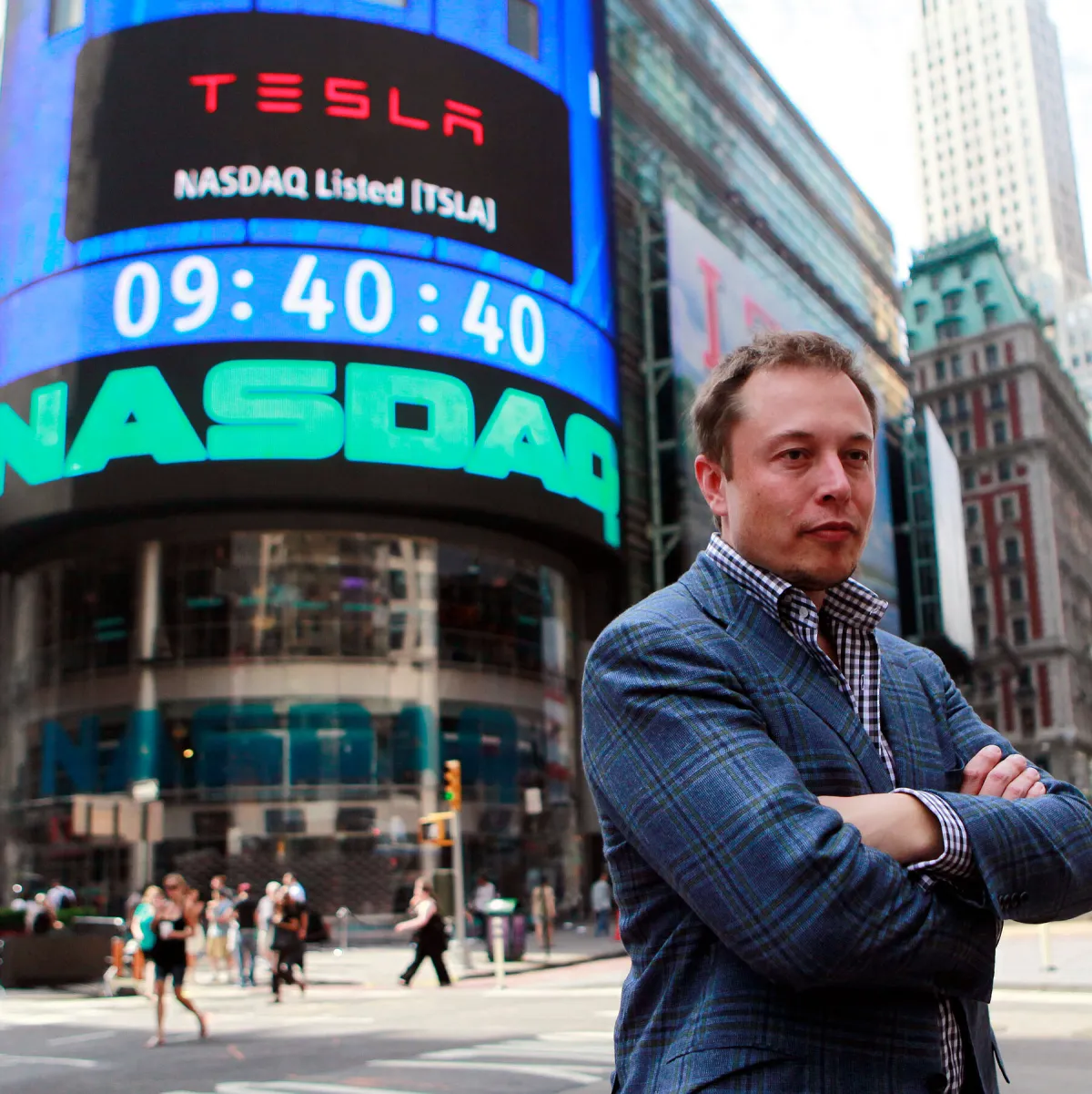 Elon Musk speaking at a business conference