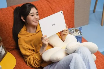 The Asus Pad tablet features a prominent OLED display and a refined aluminum chassis.