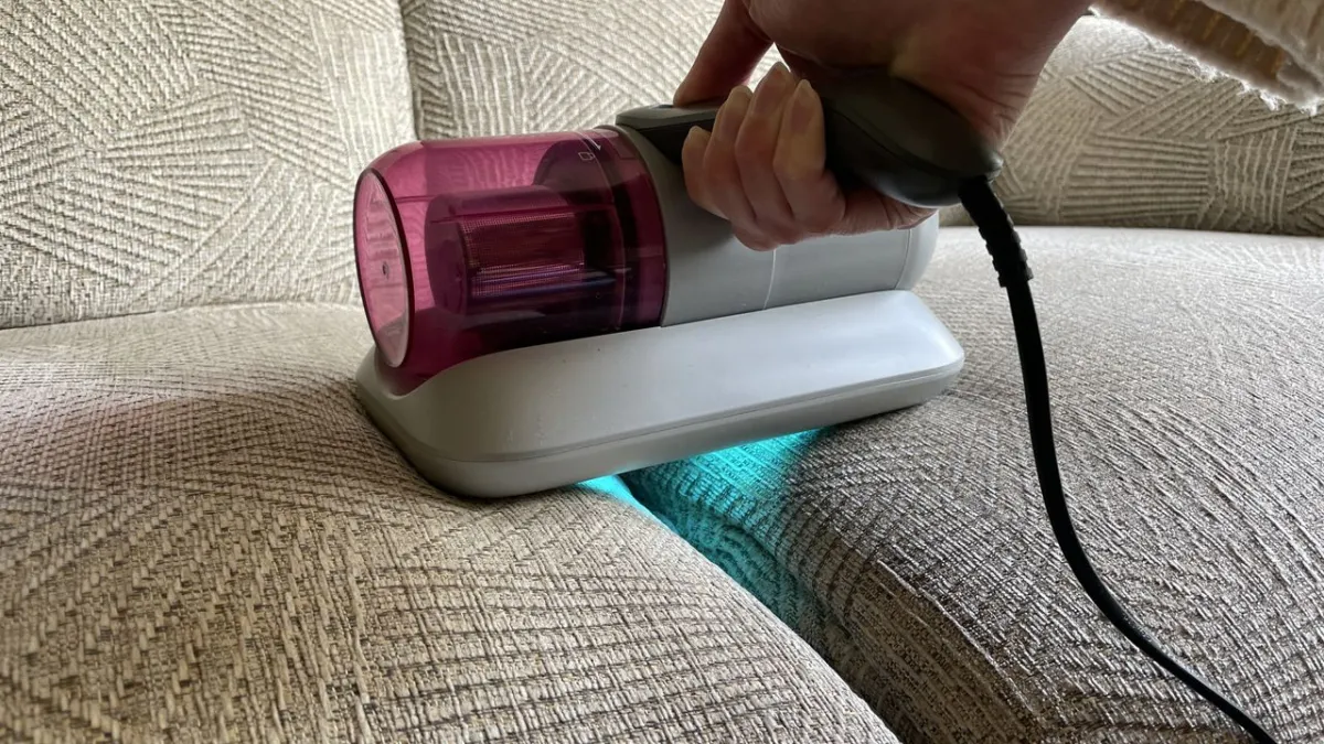 UV mattress vacuum with mechanical tapping and UV-C light for removing allergens and debris through a washable filter.