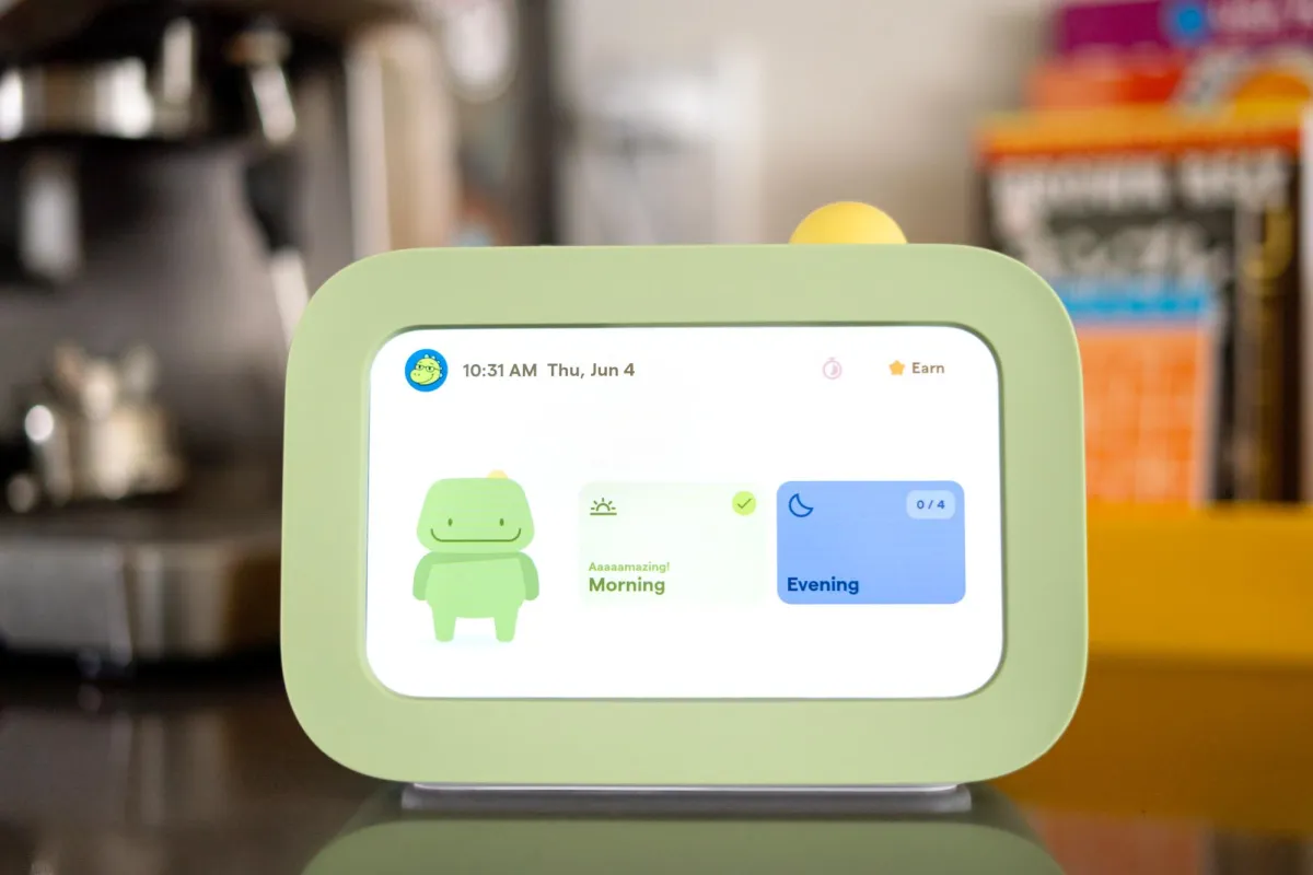 The Skylight Buddy tablet displays a daily chore list on its screen.