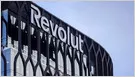 The image displays the Revolut headquarters building alongside European Central Bank regulatory documents.