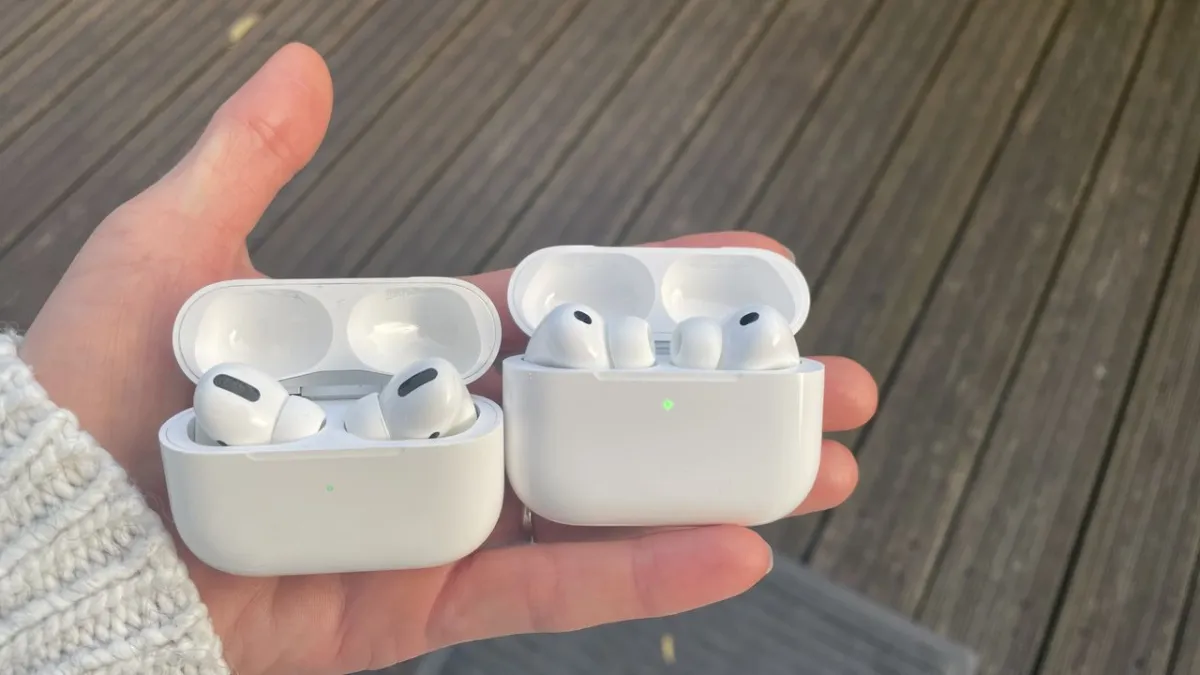 Apple AirPods Pro 3 earbuds sit inside their charging case.