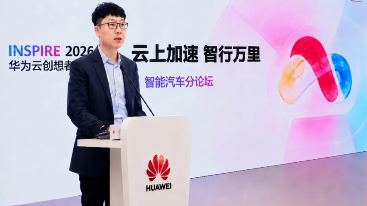 The photograph displays the Huawei Ascend 950DT artificial intelligence processor chip.