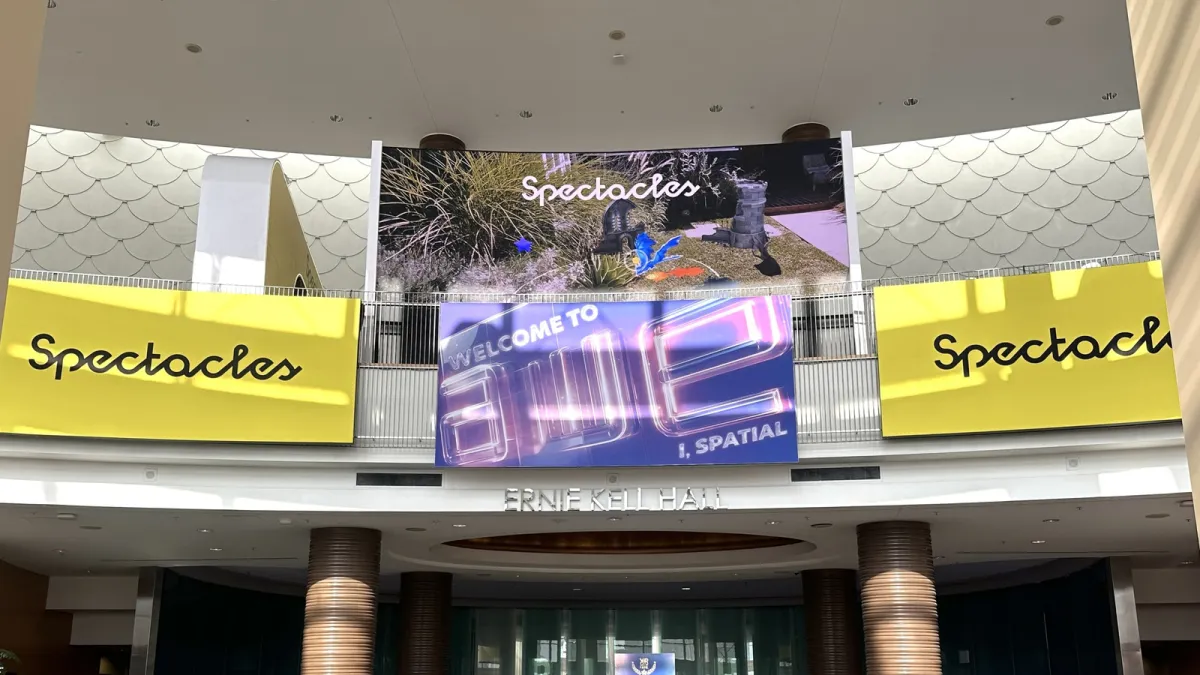 The presentation stage at Augmented World Expo 2026 displays augmented reality hardware prototypes and Android XR frameworks.