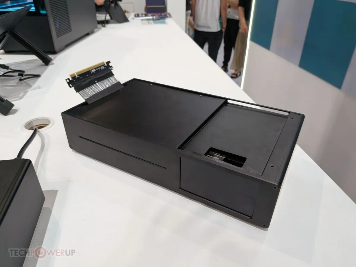The DeepCool prototype small form factor PC integrates a motherboard and CPU cooling system within a single chassis.