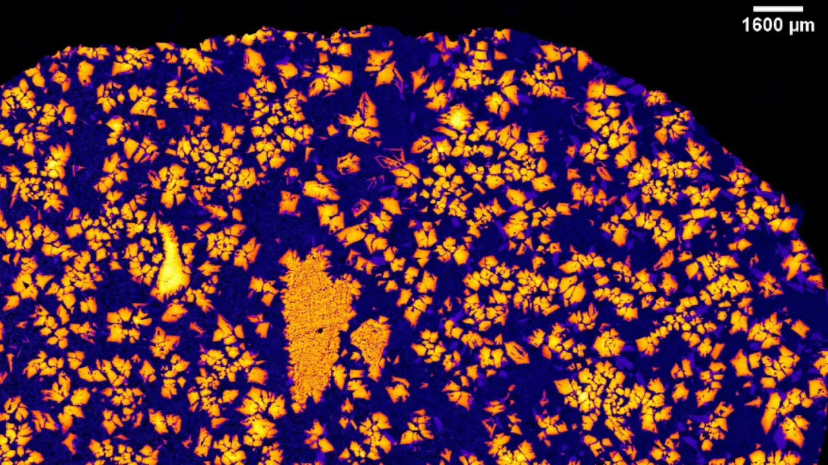 Gravitational lensing measures a dormant black hole while a Sahara meteorite reveals early protoplanet geology.