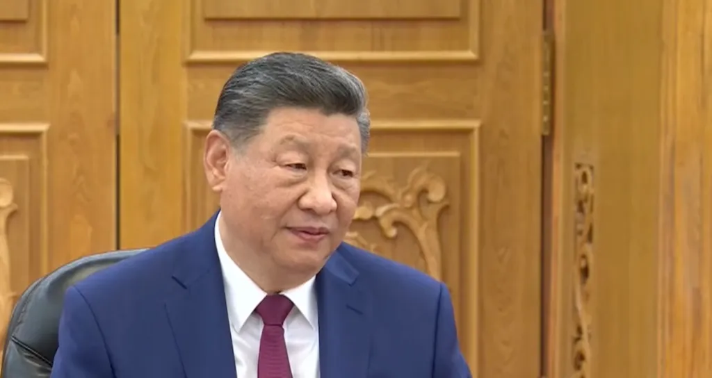 Chinese President Xi Jinping meets North Korean officials during a diplomatic visit to Pyongyang.
