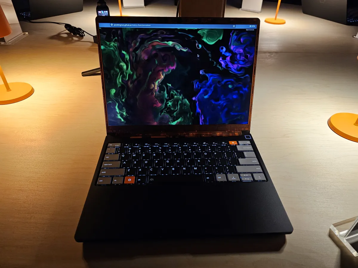 Framework Laptop 13 Pro featuring a haptic touchpad and custom display components.