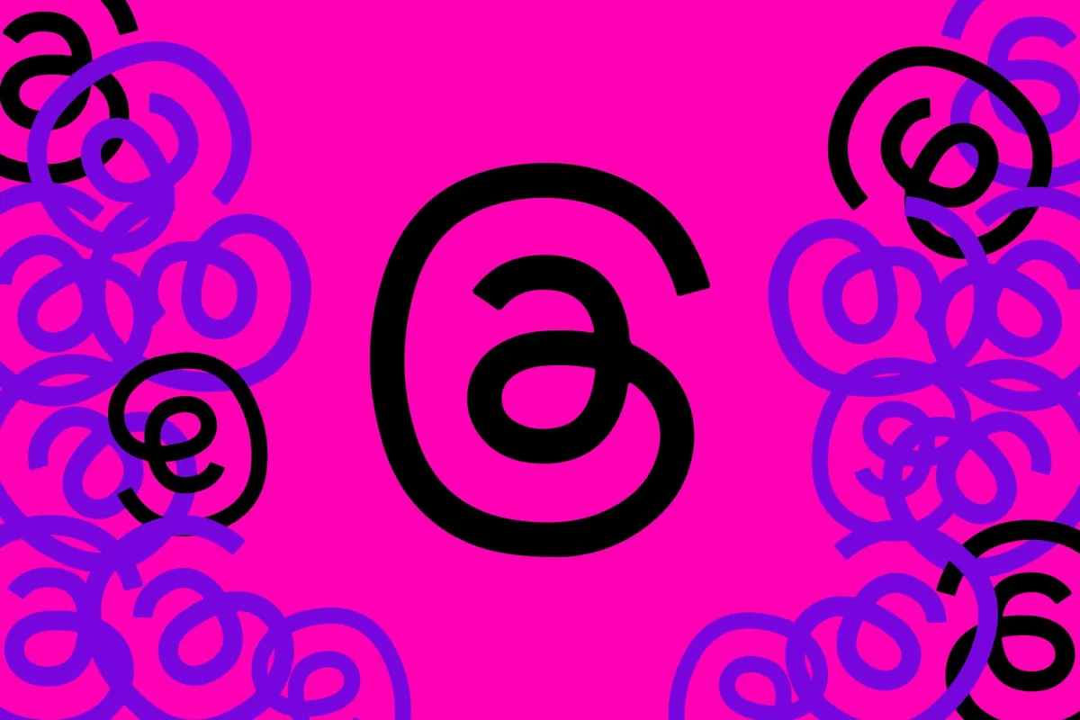 Threads logo with text displaying 500 million monthly active users.