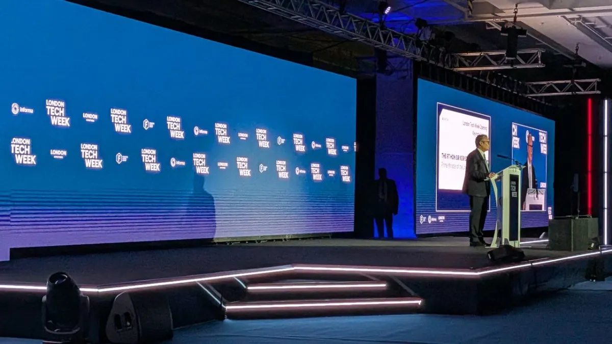 A presentation slide outlines the United Kingdom artificial intelligence strategy and sovereign computing initiatives.